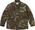 Supreme AOI Cross M52 Jacket - Woodland Camo (front)