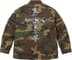 Supreme AOI Cross M52 Jacket - Woodland Camo (front)