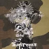 Supreme AOI Cross M52 Jacket - Woodland Camo (front)
