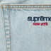 Supreme Baggy Jean - Light Washed Indigo (front)