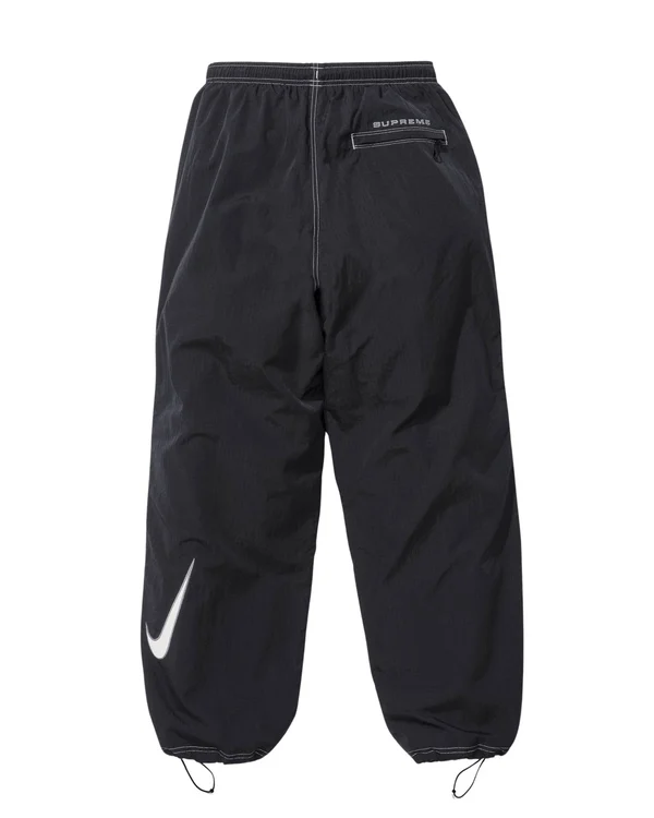 Supreme Nike Ripstop Track Pant - Supreme/Nike Track Pant_1713175909699.png (front)