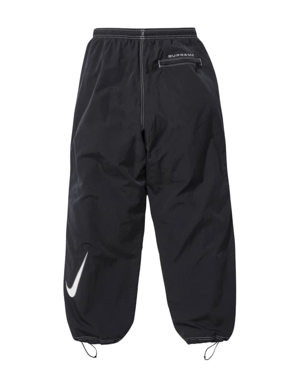 Supreme Nike Ripstop Track Pant - Supreme/Nike Track Pant_1713175909699.png (front)