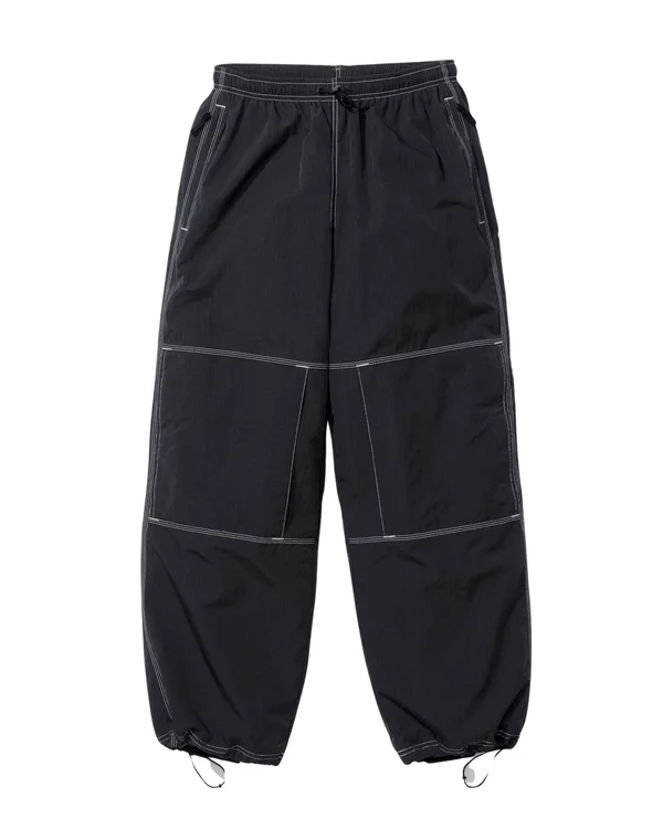 Supreme Nike Ripstop Track Pant - Supreme/Nike Track Pant_1713175912388.png (front)