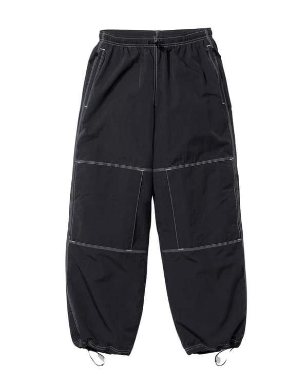 Supreme Nike Ripstop Track Pant - Supreme/Nike Track Pant_1713175912388.png (front)