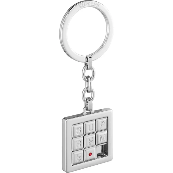 Supreme Puzzle Keychain - Silver (front)
