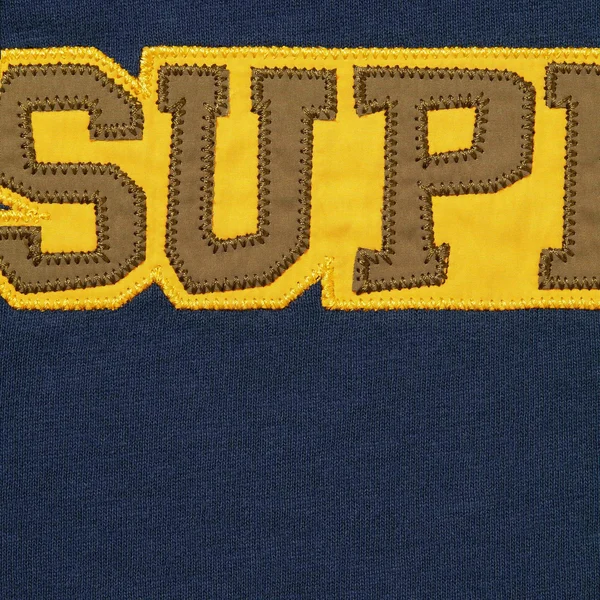 Supreme Satin Appliqué S/S Top - Navy (front)