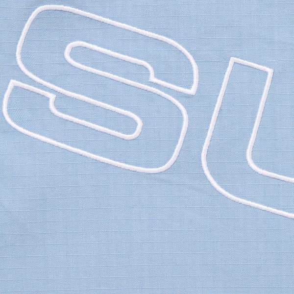 Supreme Spellout Embroidered Ripstop Track Jacket - Light Blue (front)