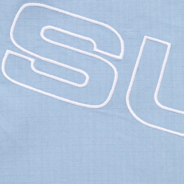 Supreme Spellout Embroidered Ripstop Track Jacket - Light Blue (front)