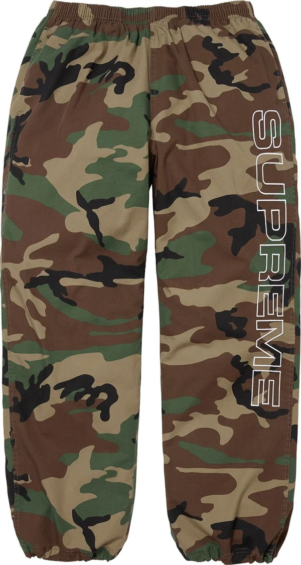 Supreme Spellout Embroidered Ripstop Track Pant - Woodland Camo (front)