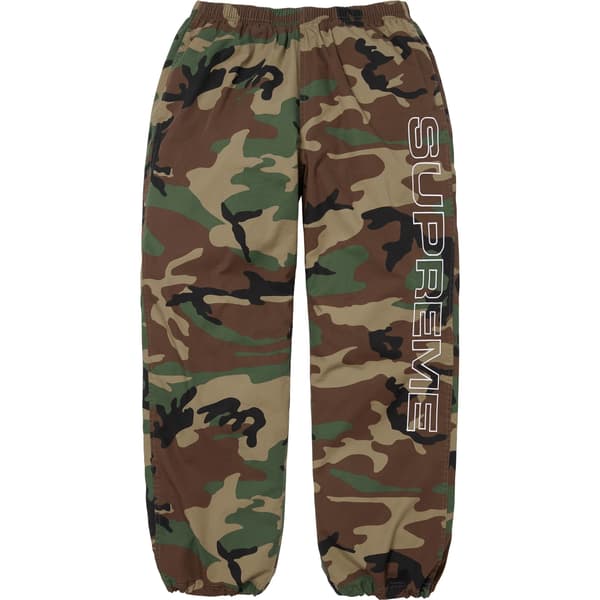 Supreme Spellout Embroidered Ripstop Track Pant - Woodland Camo (front)