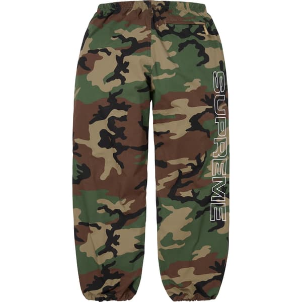 Supreme Spellout Embroidered Ripstop Track Pant - Woodland Camo (front)