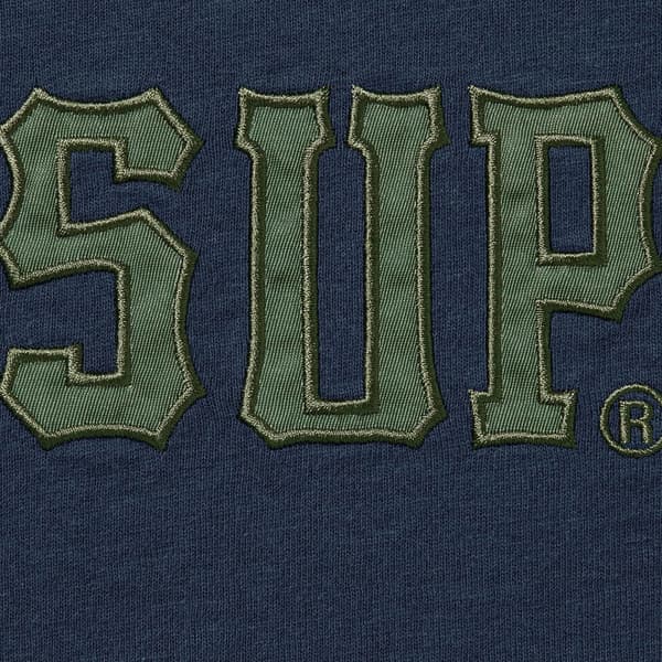 Supreme Twill Appliqué S/S Top - Navy (front)