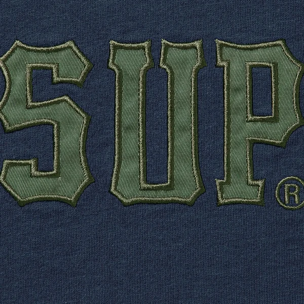 Supreme Twill Appliqué S/S Top - Navy (front)