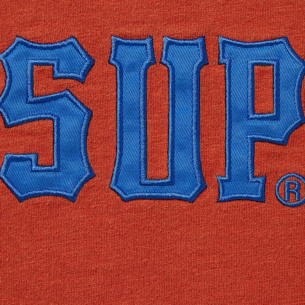 Supreme Twill Appliqué S/S Top - Orange (front)